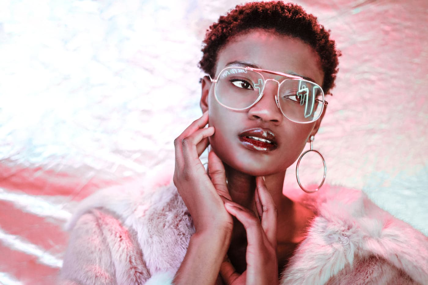 A woman wearing clear frames
